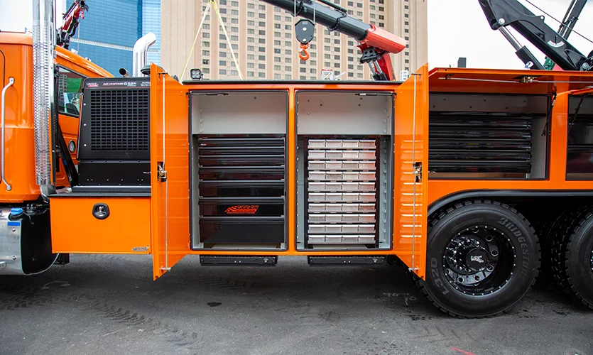 Orange Work Truck With Black Tool Drawers and Bolt Bins